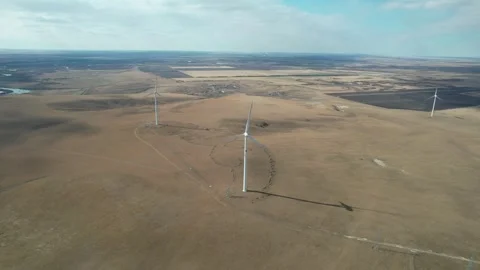 Wind Turbines Above Meandering River in Arxan, China Stock Footage 344036762