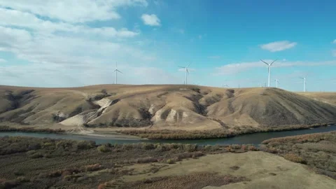 Wind Turbines Across Remote Grassland in Inner Mongolia, China Stock Footage 344036940