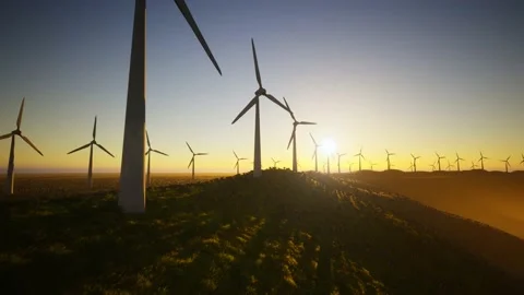 Wind Turbines Aerial Moving Camera At Sunset Stock Footage