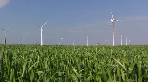 Wind turbines against blue sky Stock Footage 63264104