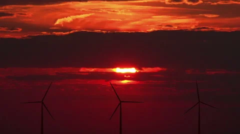 Wind turbines against red sunset 動画素材 44750869