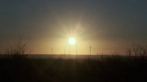 Wind Turbines Against a Sunset Sky Stock Footage 282934005