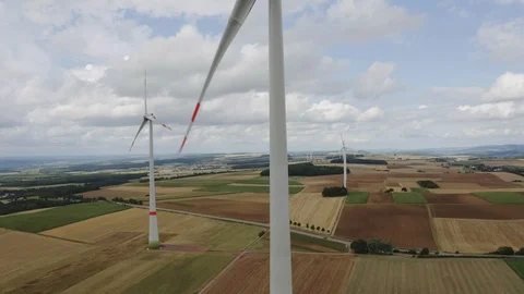 Wind Turbines with agricultural fields on the background Stock Footage 124126461