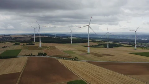 Wind Turbines with agricultural fields on the background 스톡 동영상 124126561