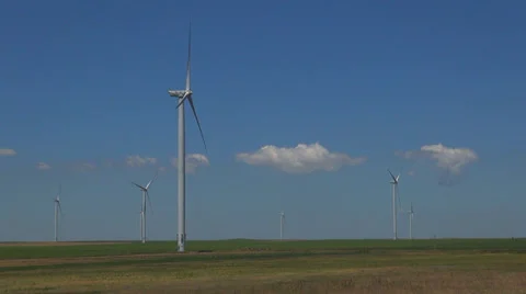 Wind Turbines in Agriculture Field, Windmill on Cultivated Land, Green Energy Stock Footage