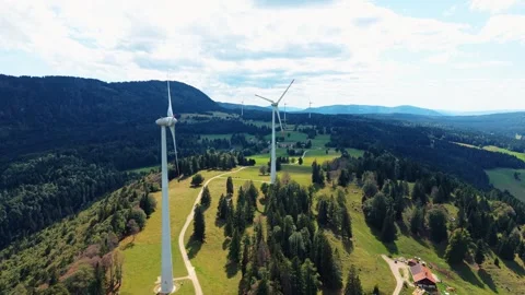 Wind Turbines Along Forest Clearing Near Sainte-Croix, Switzerland Stock Footage 345640452