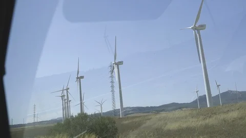 Wind Turbines along Road Video stock 97796880