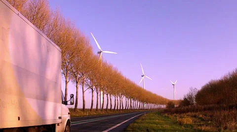 Wind turbines along the road. Time lapse. Stock Footage 33643204