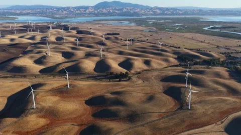 Wind Turbines Of An American Wind Power Plant Across Rolling Dry Hills Stock Footage 345289749