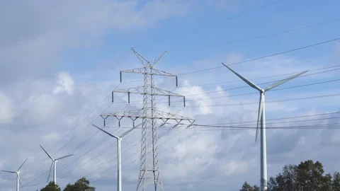 Wind turbines and power lines Stock Footage 118445876