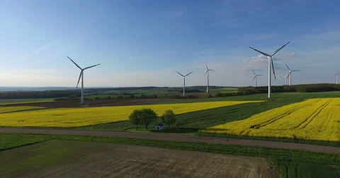 Wind turbines and rape field from above. Stock-Footage 62898296