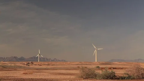 Wind turbines on a background of blue sky Stock Footage 72274299