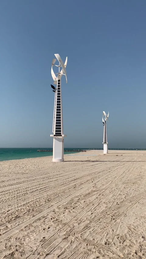 Wind turbines on a beach in Dubai Video stock 342814337