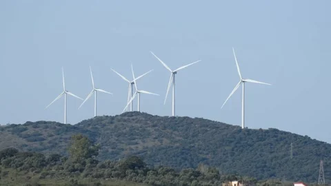 Wind turbines on beautiful cloudy day mountain landsape. Stock Footage 169698679