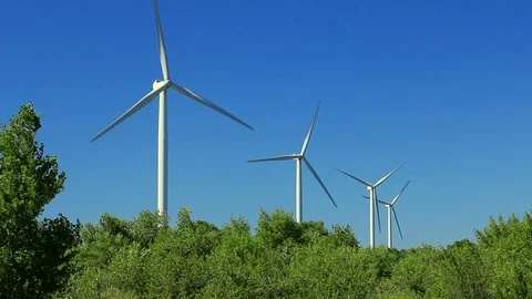 Wind turbines on blue sky background. Stock Footage 121153128