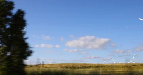 Wind turbines from car Stock Footage 116013737