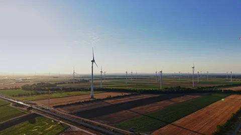 Wind turbines on a clear day in an open rural area Stock-Footage 342609251