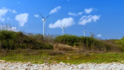 Wind turbines close up with clouds in the background Stock-Footage 124858036