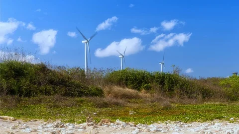 Wind turbines close up with clouds in the background Stock-Footage 124858234