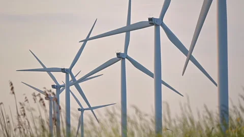 Wind turbines close-up Wind energy farm in Europe Stock Footage 241696301