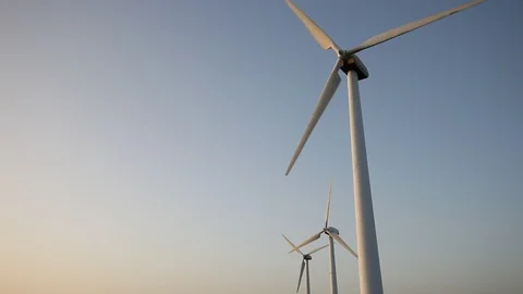 Wind turbines create renewable energy. Ecology and environment concept. Stock Footage 87649574