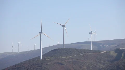 Wind turbines create renewable energy at the rural countryside landscape Stock Footage 87650401