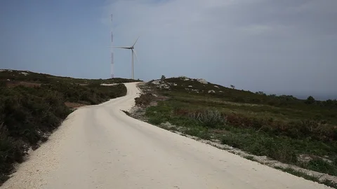 Wind turbines create renewable energy at the rural countryside landscape Stock Footage 87650565