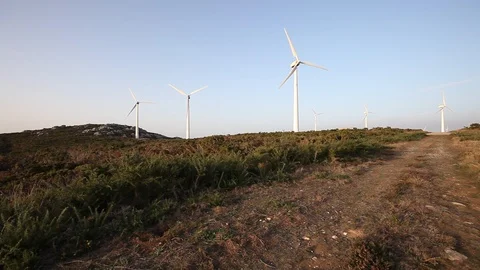 Wind turbines create renewable energy. Ecology concept of green power Stock Footage 87652423