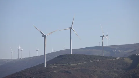 Wind turbines create renewable energy Video stock 87658105