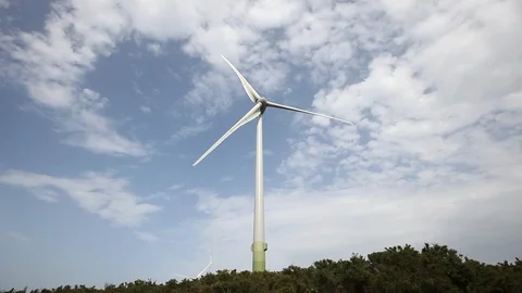 Wind turbines create renewable energy Stock Footage 87658170