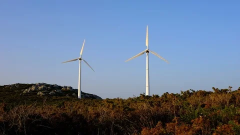 Wind turbines create renewable energy at the rural countryside landscape Video stock 88104990