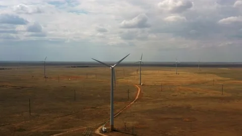 Wind turbines in the desert Stock Footage 202102270