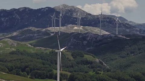Wind Turbines Distant Mountain Ridge Telephoto Krnovo Montenegro Video stock 338384456
