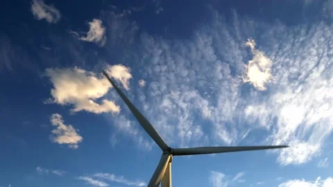 Wind turbines during sunrise. Wind farm generating green energy Stock Footage 218384201