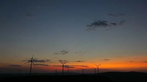 Wind Turbines in Eolic Park at the sunset Stock Footage 11849923
