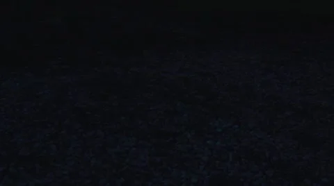 Wind Turbines Far View Pan Down - Sunset.mp4 Stock Footage 53504440