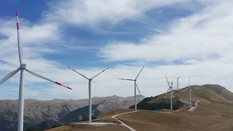 Wind turbines in a farm, generating renewable electrical energy Stock Footage 160761753