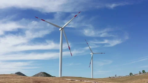 Wind turbines in a farm, generating renewable electrical energy Stock Footage 160775507