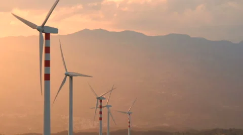 Wind turbines farm at sunset Stock Footage 65392568