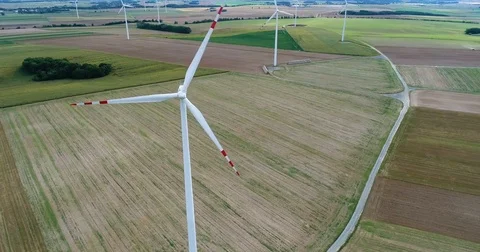 Wind turbines on the field during cloudy day 스톡 동영상 80216138