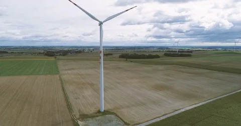 Wind turbines on the field during cloudy day 스톡 동영상 80225806