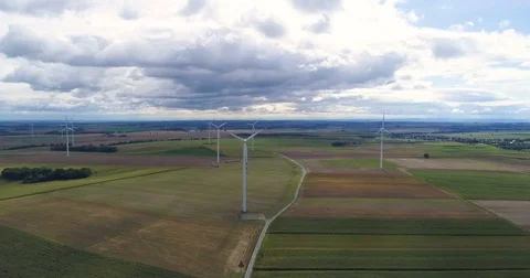 Wind turbines on the field during cloudy day 스톡 동영상 80249278