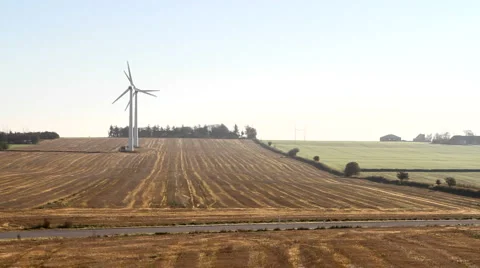 Wind turbines on a field Stock Footage