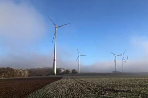Wind turbines in a field Stock Photos