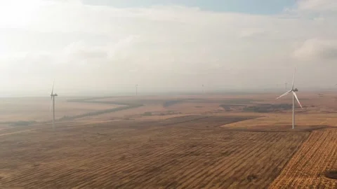 Wind turbines on field, soft citematic light Stock Footage 168258202