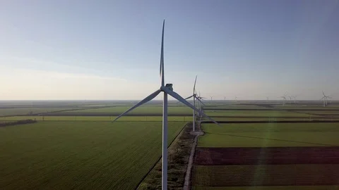 Wind turbines in the fields Stock Footage 129138010