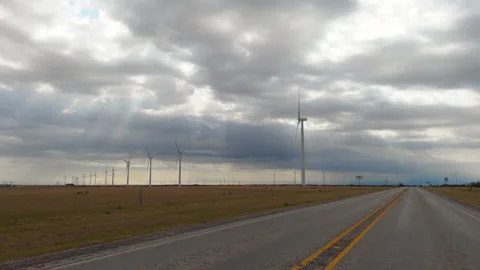 Wind turbines in fields seen from country road, Sweetwater, Texas, USA Stock Footage 162755166