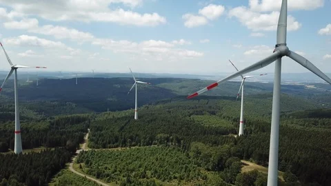 Wind turbines forest Stock Footage 99079238