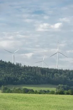 Wind turbines in a forest Stock Photos