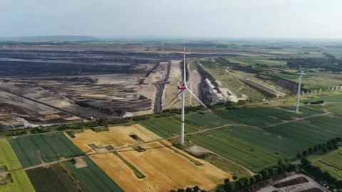 Wind turbines in front of open pit lignite mine, aerial drone video. Renewable Vidéo 312006620